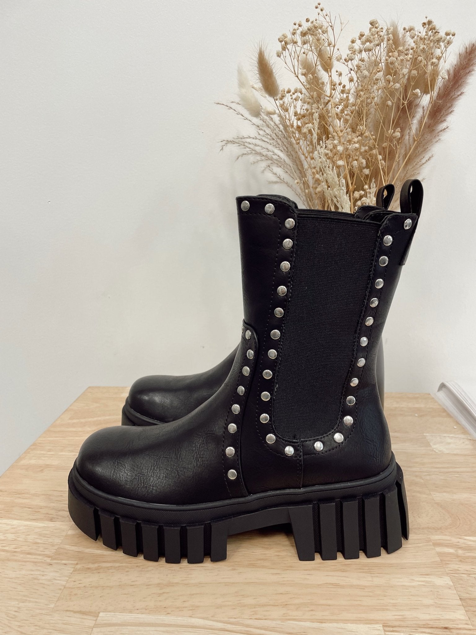 Black boots shop with silver studs